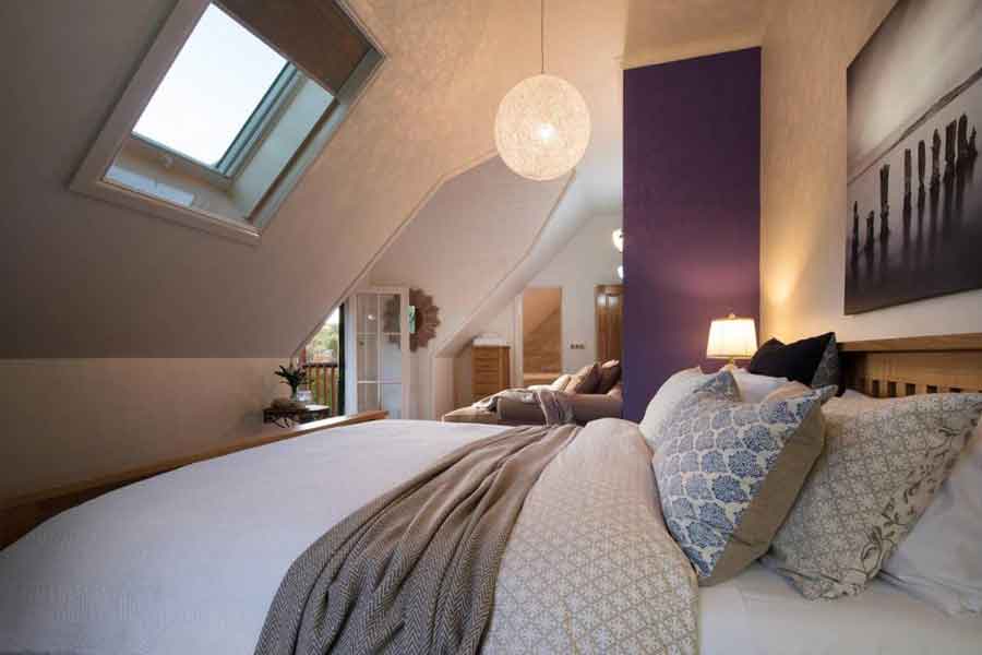 Attic bedroom with skylight